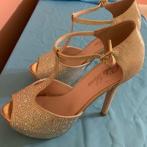 Rose gold heels. Worn one time durn my wedding 5 years ago on today.